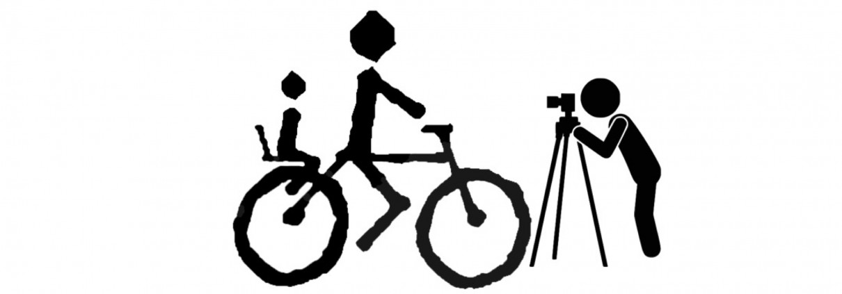 Imagen de figuras en negro de ciclista y fotógrafo